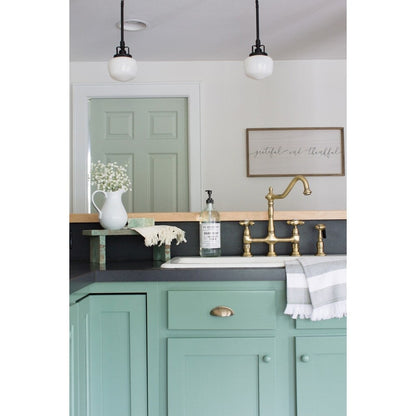 Robinet de cuisine Kingston Brass Heritage Bridge avec douchette en laiton