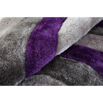 Tapis à poils longs Mateos au design abstrait