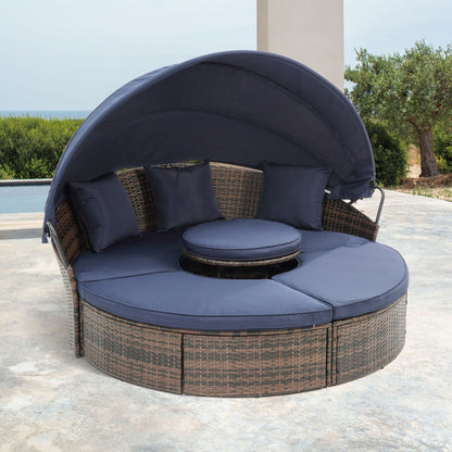 Lit de repos rond en rotin pour extérieur avec table basse relevable, canapé-lit profond bleu marine avec oreillers et coussins lavables